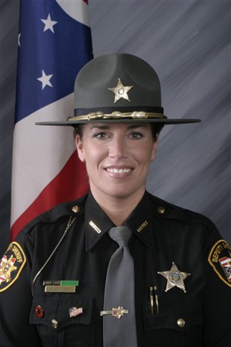 This undated photo released by the Clark County Sheriff's Office in Ohio shows Clark County Sheriff's Deputy Suzanne Hopper. Hopper, a 12-year veteran of her agency and a former officer of the year who frequently won commendations for her work, was killed Saturday, Jan. 1, 2011, in a trailer park standoff. (AP Photo/Clark County Sheriff's Office)
